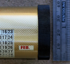 A PLASTIC DESK CALLENDAR FOR A DESK BASE